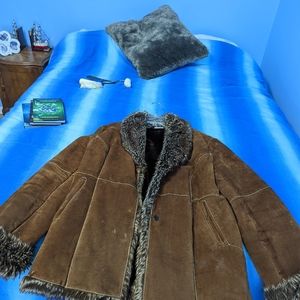 Mink coat, Suede jacket, costume jewelery.